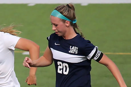 Lauren Bull playing soccer with her high school team, the Central Columbia Lady Jays.