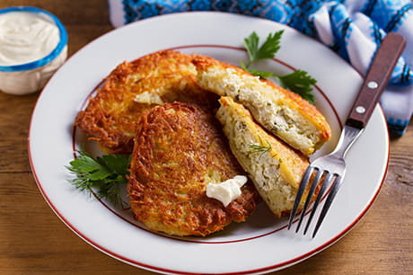 Cheesy cauliflower latkes