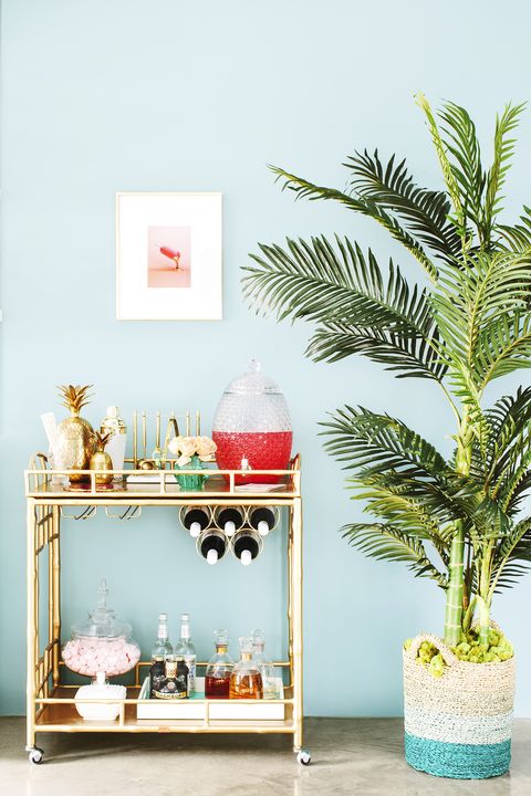 living room bar cart and plant