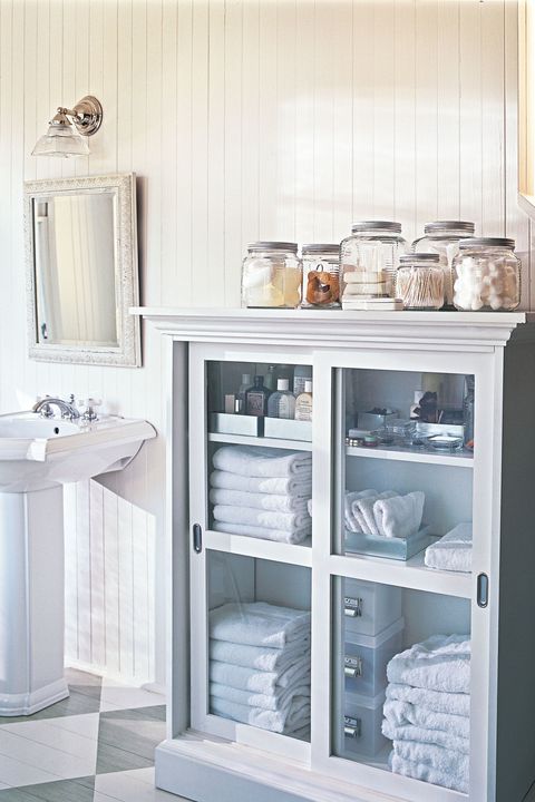 shallow cabinet and glass canisters