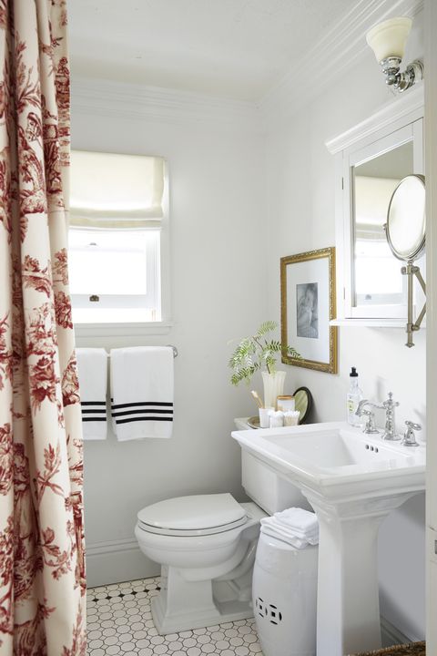 bathroom with red curtain