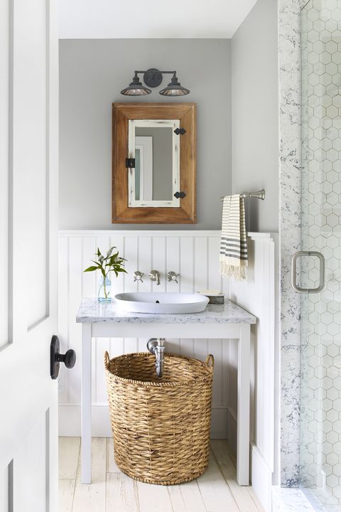 bathroom with wall mounted faucets